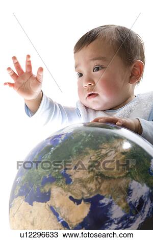 Stock Image - Baby and Globe. Fotosearch