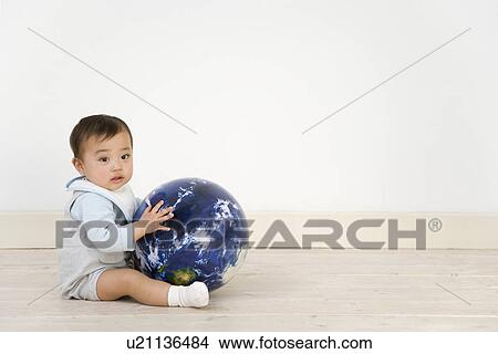 Baby Holding Globe View Large Photo Image Picture - Baby Holding Globe. Fotosearch