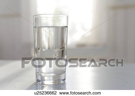Stock Image - Rice Fish in Glass. Fotosearch