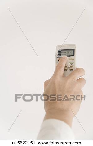 Right Hand Holding a Remote Control View Large Photo Image Stock Image - Right Hand Holding a Remote Control. Fotosearch