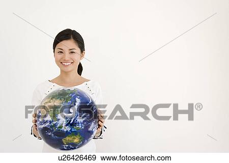 Woman Holding A Globe, Copy Space View Large Photo Image Stock Photo - Woman Holding A Globe, Copy Space. Fotosearch