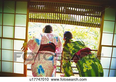 Two Young Woman Wearing A Yukata View Large Photo Image Stock Image - Two Young Woman Wearing A Yukata. Fotosearch