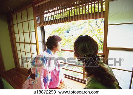 Two Young Woman Wearing A Yukata View Large Photo Image Stock Image - Two Young Woman Wearing A Yukata. Fotosearch