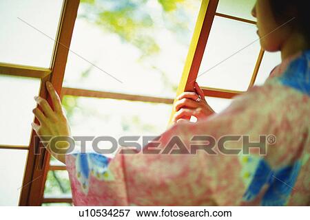 Stock Photo - Young Women Wearing A Yukata. Fotosearch