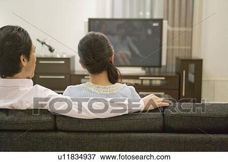 Stock Photo - Japanese Couple At Living Room. Fotosearch