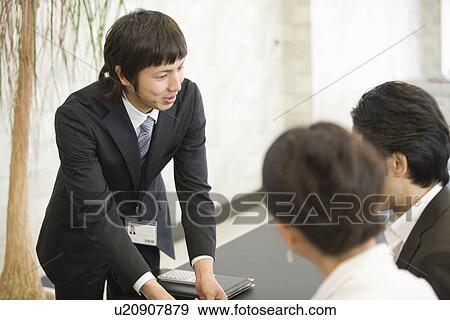 Japanese Couple Business Talking View Large Photo Image Stock Photo - Japanese Couple Business Talking. Fotosearch