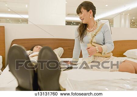 Japanese Couple Looking Of Furniture View Large Photo Image Stock Image - Japanese Couple Looking Of Furniture. Fotosearch