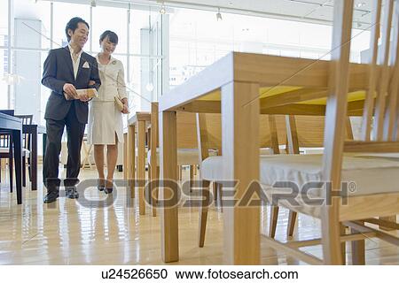 Japanese Couple Looking Of Furniture View Large Photo Image Stock Image - Japanese Couple Looking Of Furniture. Fotosearch