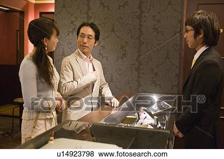 Japanese Couple, Payment View Large Photo Image Stock Photo - Japanese Couple, Payment. Fotosearch