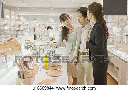 Picture - Japanese Couple, Shopping. Fotosearch