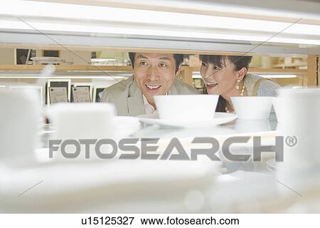 Stock Photo - Japanese Couple, Shopping. Fotosearch