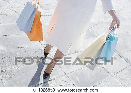 Stock Photo - Shopping Bag With Woman. Fotosearch