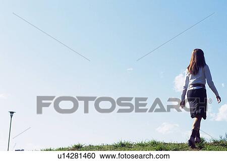 Stock Image - Japanese plum flowers, close up, blurred motion, differential focus. Fotosearch