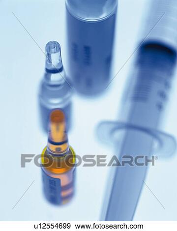 Ampoules and syringe View Large Photo Image Stock Photo - Ampoules and syringe . Fotosearch