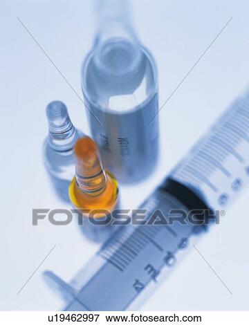 Ampoules and syringe View Large Photo Image Stock Photo - Ampoules and syringe . Fotosearch