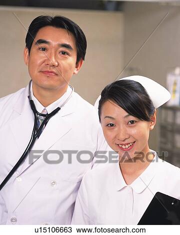 Stock Image - Doctor and nurse, portrait. Fotosearch