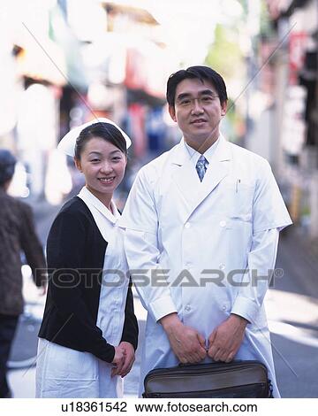 Stock Image - Doctor and nurse, portrait. Fotosearch