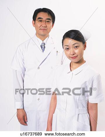 Stock Photo - Doctor and nurse, portrait. Fotosearch