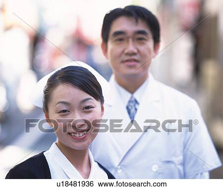 Stock Photograph - Doctor and nurse, portrait. Fotosearch