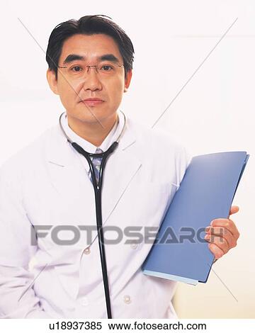 Stock Photography - Male doctor, portrait. Fotosearch