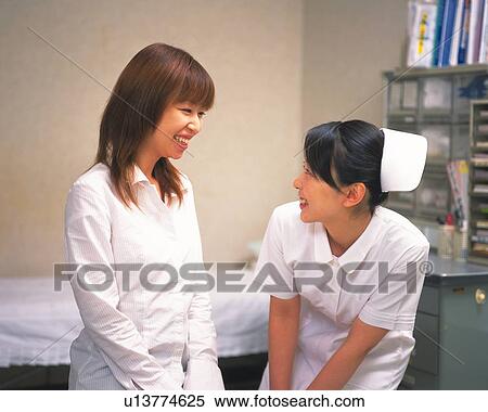 Nurse examining patient View Large Photo Image Stock Photography - Nurse examining patient. Fotosearch