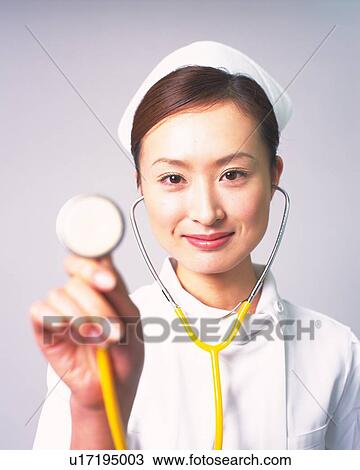 Stock Image - Nurse, portrait, close-up. Fotosearch