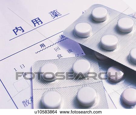 Picture - Packet of white tablets . Fotosearch