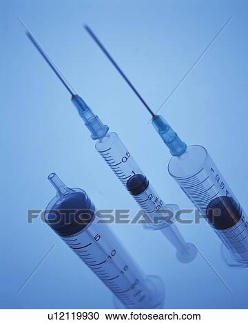 Stock Image - Three syringes . Fotosearch
