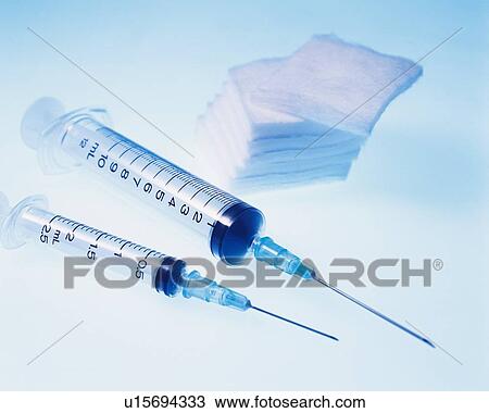 Two syringes and cottons View Large Photo Image Stock Image - Two syringes and cottons. Fotosearch
