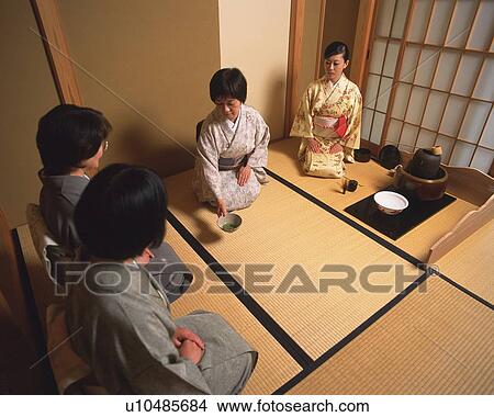 Four women attending Japanese tea ceremony, high angle view, Japan View Large Photo Image Picture - Four women attending Japanese tea ceremony, high angle view, Japan. Fotosearch