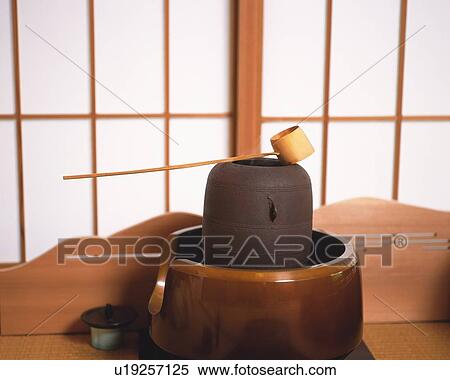 Japanese tea kettle in front of sliding door in a room, front view, Japan View Large Photo Image Stock Photography - Japanese tea kettle in front of sliding door in a room, front view, Japan. Fotosearch