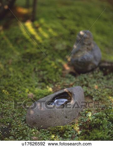 Stock Image - Stones in Japanese garden, Japan, high angle view, differential focus. Fotosearch