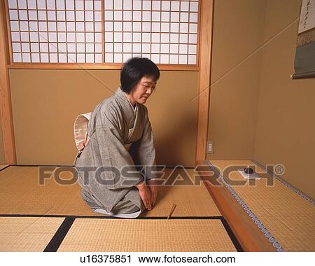 Woman in kimono sitting on Tatami mat, side view, Japan View Large Photo Image Stock Image - Woman in kimono sitting on Tatami mat, side view, Japan. Fotosearch