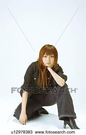Fashion portrait of a young woman View Large Photo Image Stock Image - Fashion portrait of a young woman. Fotosearch