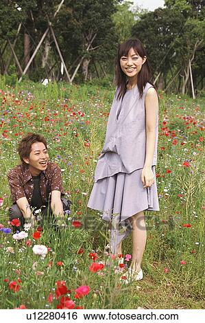 Stock Photograph - Young couple, portrait. Fotosearch