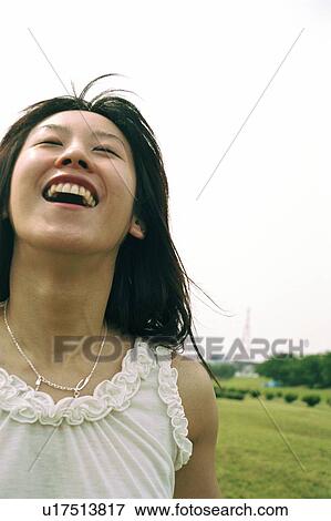 Stock Photo - Young woman, portrait. Fotosearch