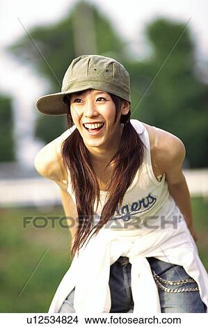 Picture - Young woman smiling. Fotosearch