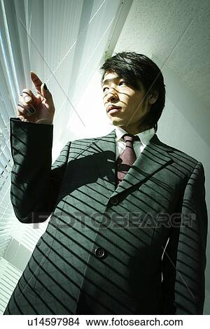Business Man Looking Outside Through The Blind View Large Photo Image Picture - Business Man Looking Outside Through The Blind. Fotosearch