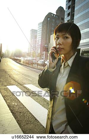 Business Woman Talking on the Phone View Large Photo Image Picture - Business Woman Talking on the Phone. Fotosearch