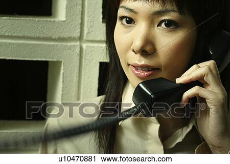 Business Woman Talking on the Phone View Large Photo Image Stock Image - Business Woman Talking on the Phone. Fotosearch