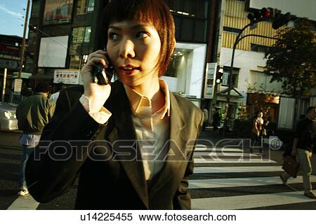 Stock Photography - Business Woman Talking on the Phone. Fotosearch