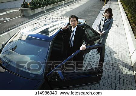 Stock Image - Business Man and Business Woman. Fotosearch