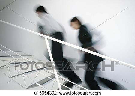 Business Man and Business Woman Walking Up Stairs View Large Photo Image Stock Image - Business Man and Business Woman Walking Up Stairs. Fotosearch