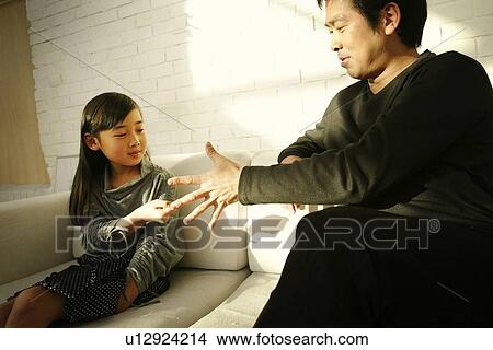 Picture - Father and His Daughter Playing Together. Fotosearch