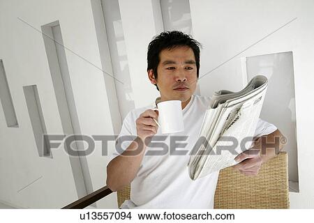 Picture - Mature Adult Man Drinking a Coffee. Fotosearch