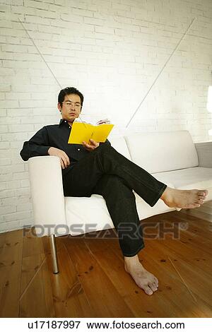 Mature Adult Man Reading a Book View Large Photo Image Stock Photo - Mature Adult Man Reading a Book. Fotosearch