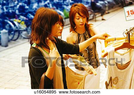 Three Young Adult Women shopping View Large Photo Image Stock Photography - Three Young Adult Women shopping. Fotosearch