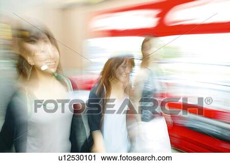 Stock Image - Three Young Adult Women. Fotosearch