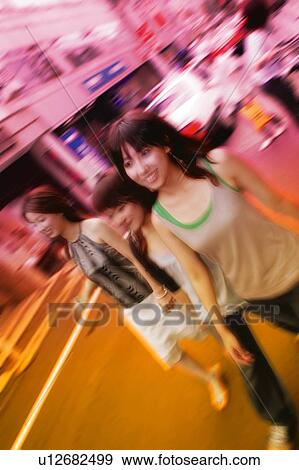Stock Photo - Three Young Adult Women. Fotosearch