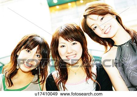 Stock Photo - Three Young Adult Women. Fotosearch